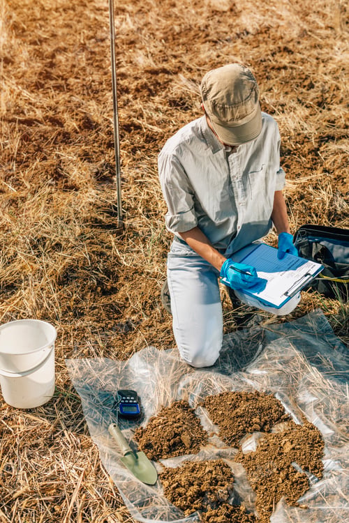 Preview: Soil Test. Female Agronomist Taking Notes In The Field