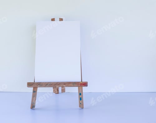 Preview: Blank Canvas on Easel Against a White Background