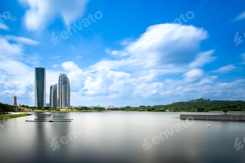 Preview: Modern skyline of Putrajaya, Malaysia with tall towers and calm lake