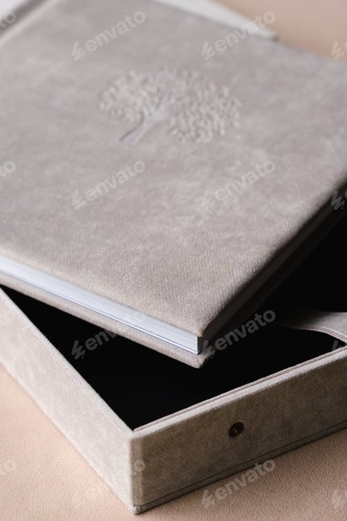 Preview: The photo book is grey in a soft cloth cover. the concept of creating books and albums