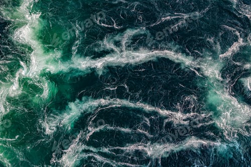 Preview: Blue waves of water of the river and the sea meet each other during high tide and low tide.