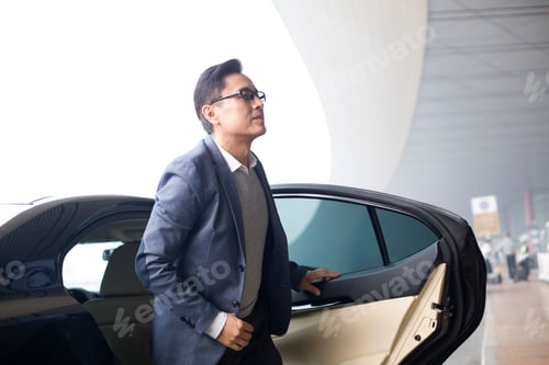 Preview: Businessman getting off car