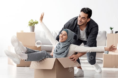 Preview: Emotional middle-eastern family having fun while unpacking stuff