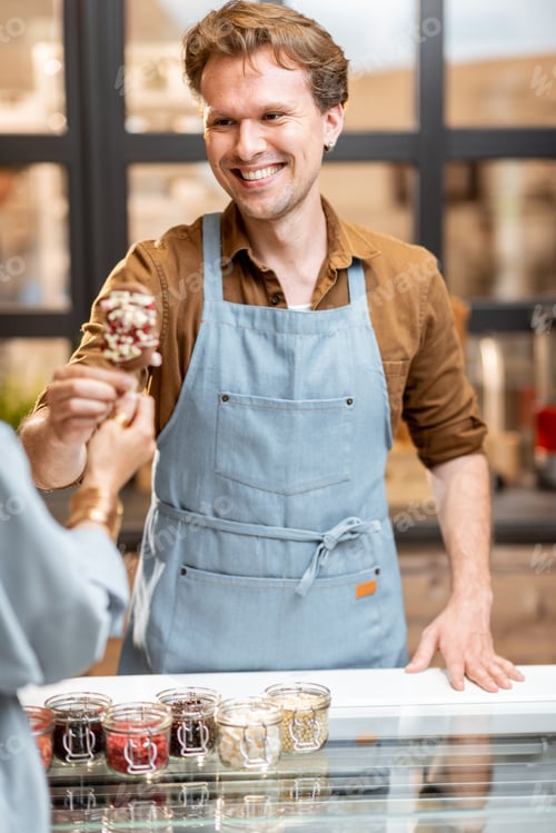 Preview: Man selling ice cream at the shop