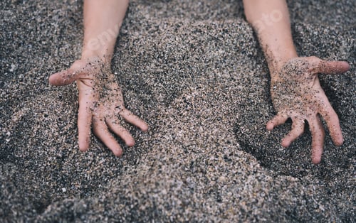 Preview: Woman doing yoga practice and meditating on the beach