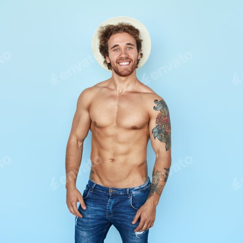 Preview: Shirtless tattooed man in hat