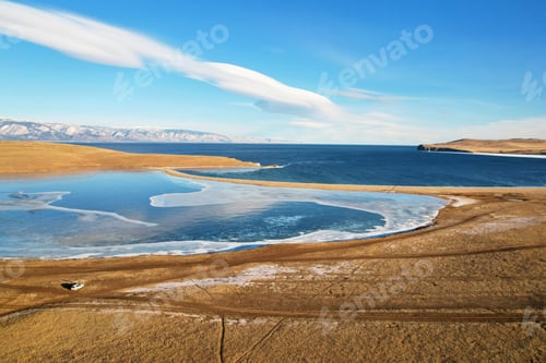 Preview: Frozen Lake Khankhoy on the island of Olkhon and unfrozen Lake Baikal