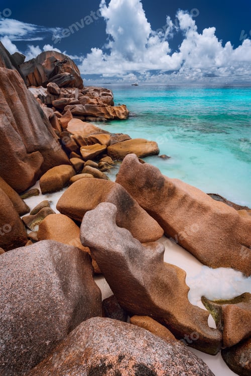 Preview: Grande anse located on La Digue island, Seychelles. Sandy beach with orange granite boulders and