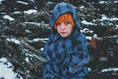 Preview: Redhead androgynous model in a winter scene