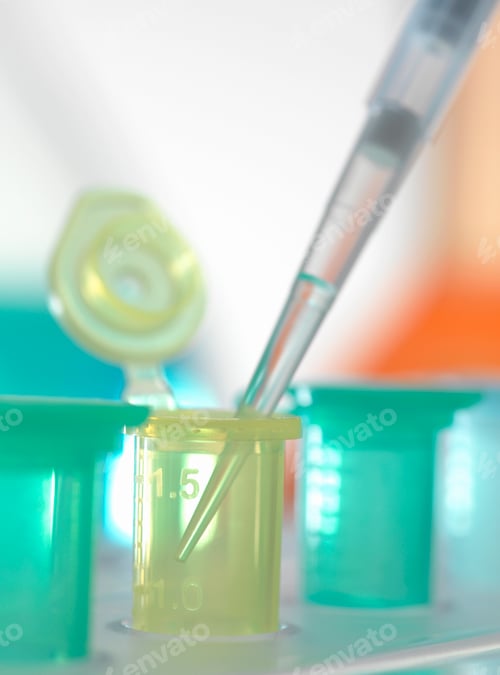 Preview: Pipette adding sample to eppendorf tube in a laboratory