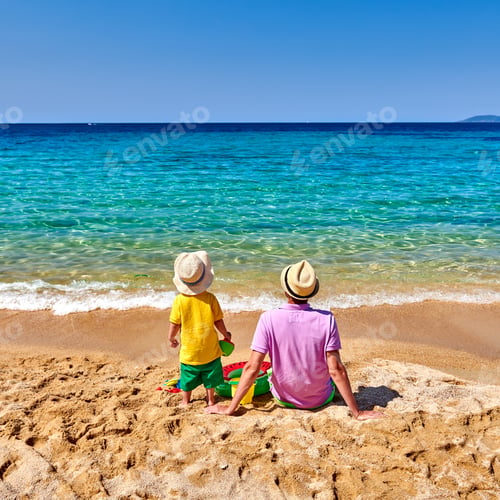 Preview: Two Year Old Toddler Boy On Beach With Father. Inflatable Ring And Beach Toys. Summer Family
