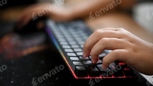 Preview: boy's hands on the computer keyboard. concept