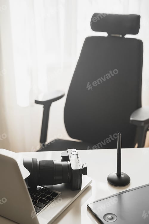 Preview: Photographer's workplace with a mirrorless camera, laptop and graphics tablet