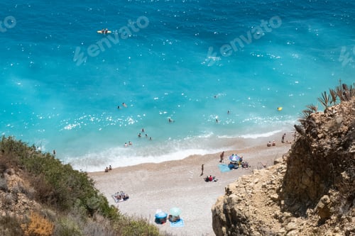 Preview: Beautiful beach with clear blue waters and white sand in Cala Moraig, Spain