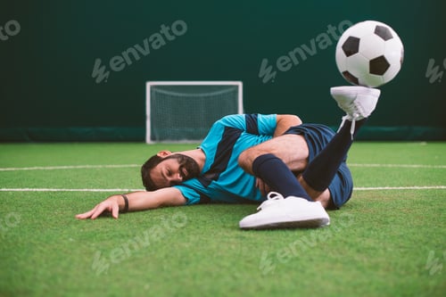 Preview: Cinematic image of a soccer freestyle player making tricks with the ball.