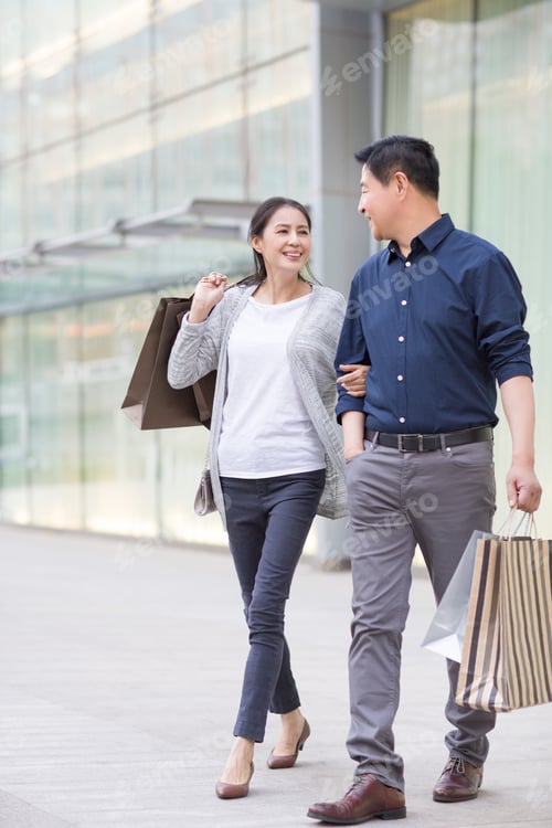 Preview: Happy mature couple shopping