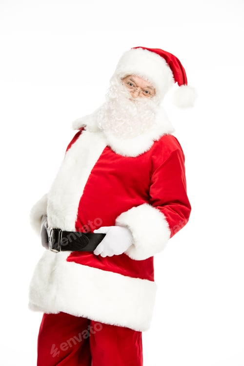 Preview: Three quarter length view of Santa Claus posing and gesturing isolated on white