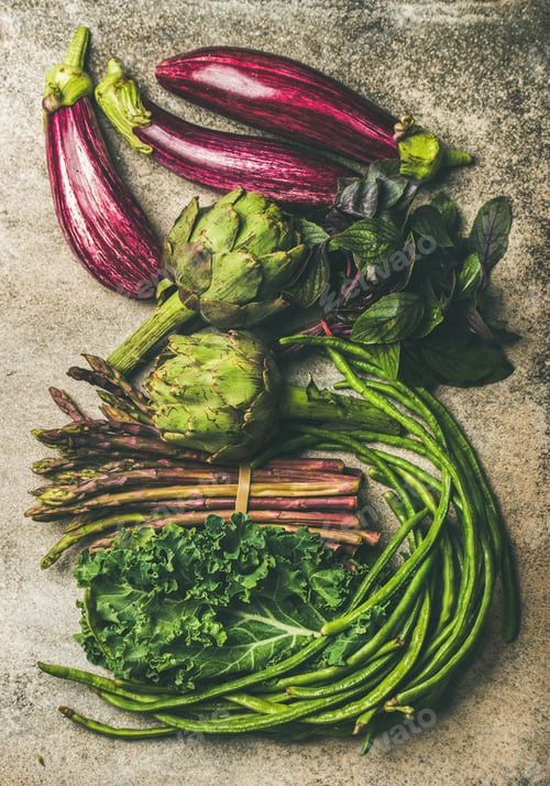 Preview: Flat-lay of fresh green and purple vegetables