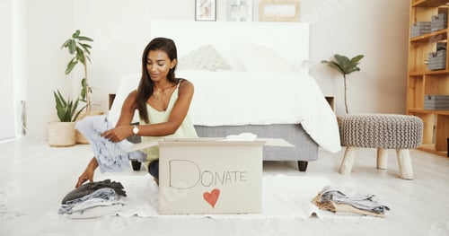 Preview: Woman, home or box to donate clothes for charity, nonprofit or community service for support. India