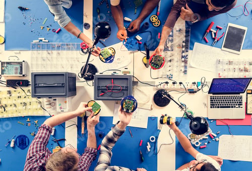 Preview: Technician team working at electronics repair shop
