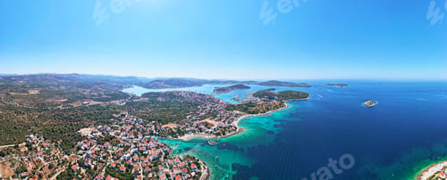 Preview: Islands in sea covered with lush greenery, aerial view. Rogoznica, Croatia