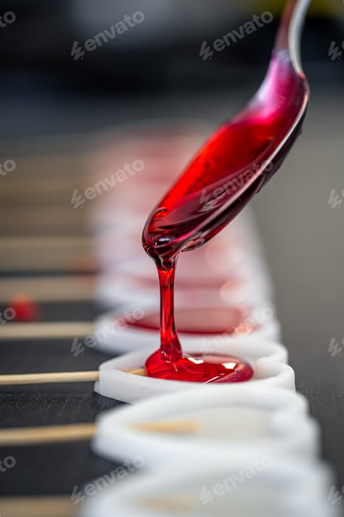 Preview: Close-up, the process of making lollipops from natural ingredients.