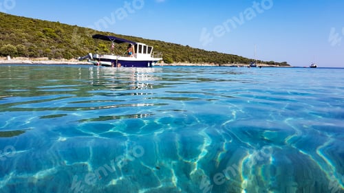 Preview: Boats moored in bay of sea with beautiful turquoise water.