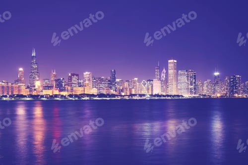 Preview: Vintage toned picture of Chicago city skyline at night.