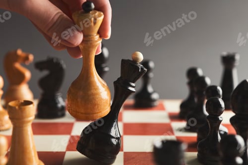 Preview: Hand take checkmate on chessboard during game