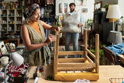 Preview: Wiping dust from secondhand wooden chair