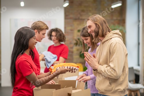 Preview: Workers of the non profit organization distributing donations