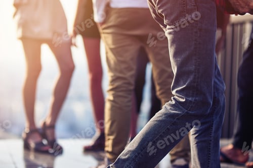 Preview: Close up of people's legs at the party