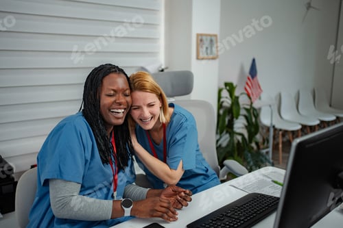 Preview: Diverse female medical coworkers laughing having fun together