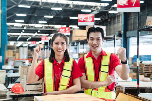 Preview: Group Portrait of the workers smiling and happy in the warehouse.