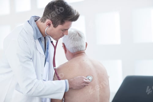 Preview: Doctor ausculating patient