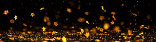 Preview: Glittering gold stars of bokeh use for celebrate background