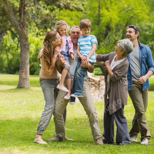 Vista previa: Full Length Of An Extended Family Playing In The Park