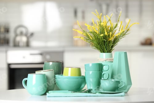 Preview: Kitchen utensils in different mint color shades on table