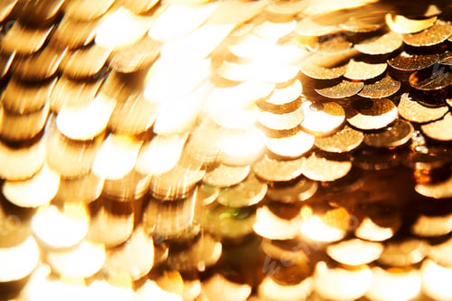 Preview: Abstract festive gold background made of sequins.