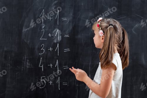 Preview: Schoolgirl solving math problems
