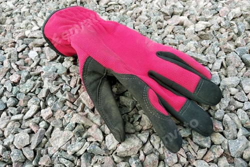 Preview: Red glove on gravel stones