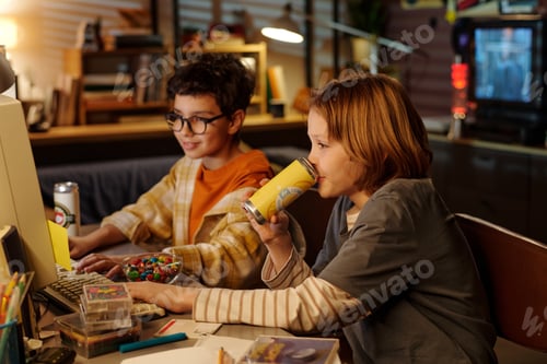 Preview: Kids Collaborating on Computer Project in Office Setting