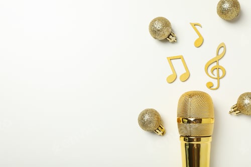 Preview: Golden microphone with notes on a light background.