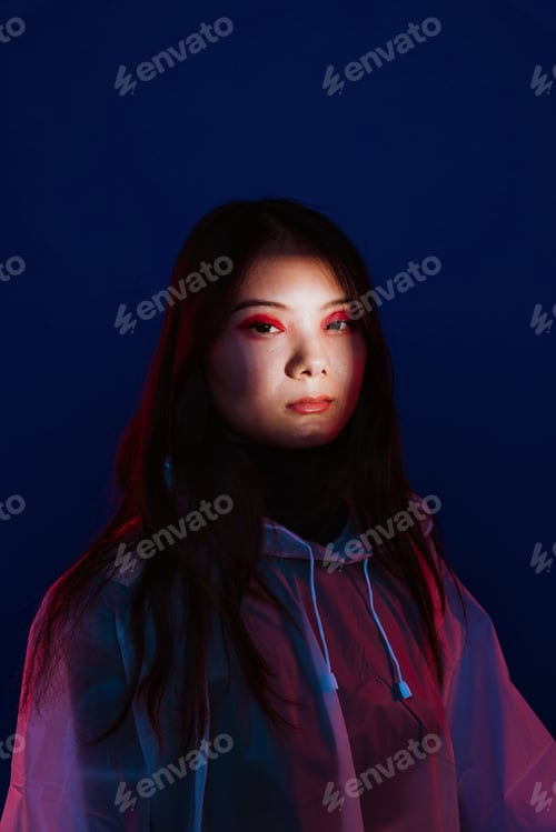 Preview: Woman in hooded cloak with glowing red eyes
