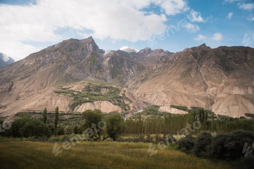 Preview: Karakoram mountains and green valley along baltoro trek. Baltoro