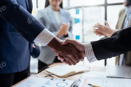 Preview: Successful negotiation, handshake.