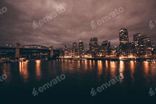 Preview: Beautiful shot of the city and the river at night