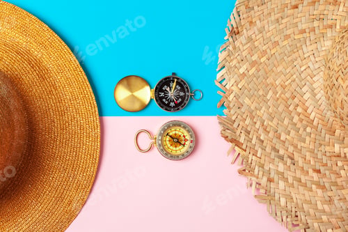 Preview: Compass on pink background, top view. creative photo