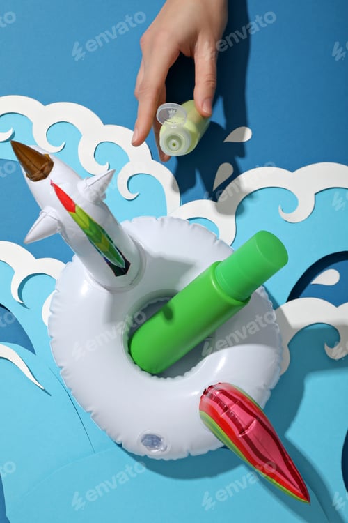 Preview: Tanning agents on a beach lounger, against the background of waves.