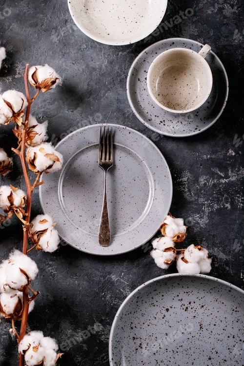 Preview: A blue modern ceramic plate with silver fork